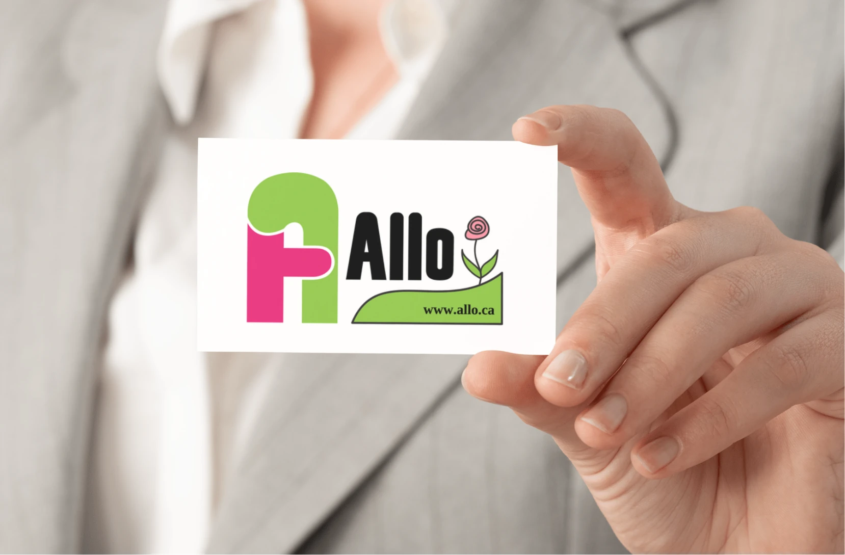 Allo business card held in hand